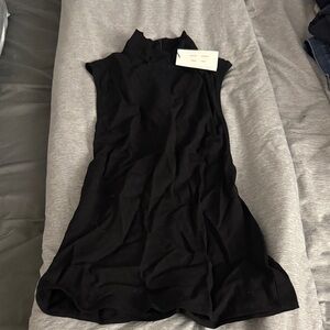Elegant Black Sleeveless Top with Open Back